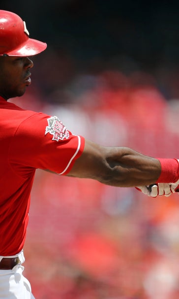 Reds rally for 2 in 9th, win 3-2 for rare sweep of Astros